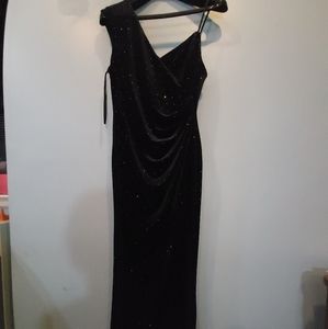 This is a BCBGMaxAzria black silk zip up dress
